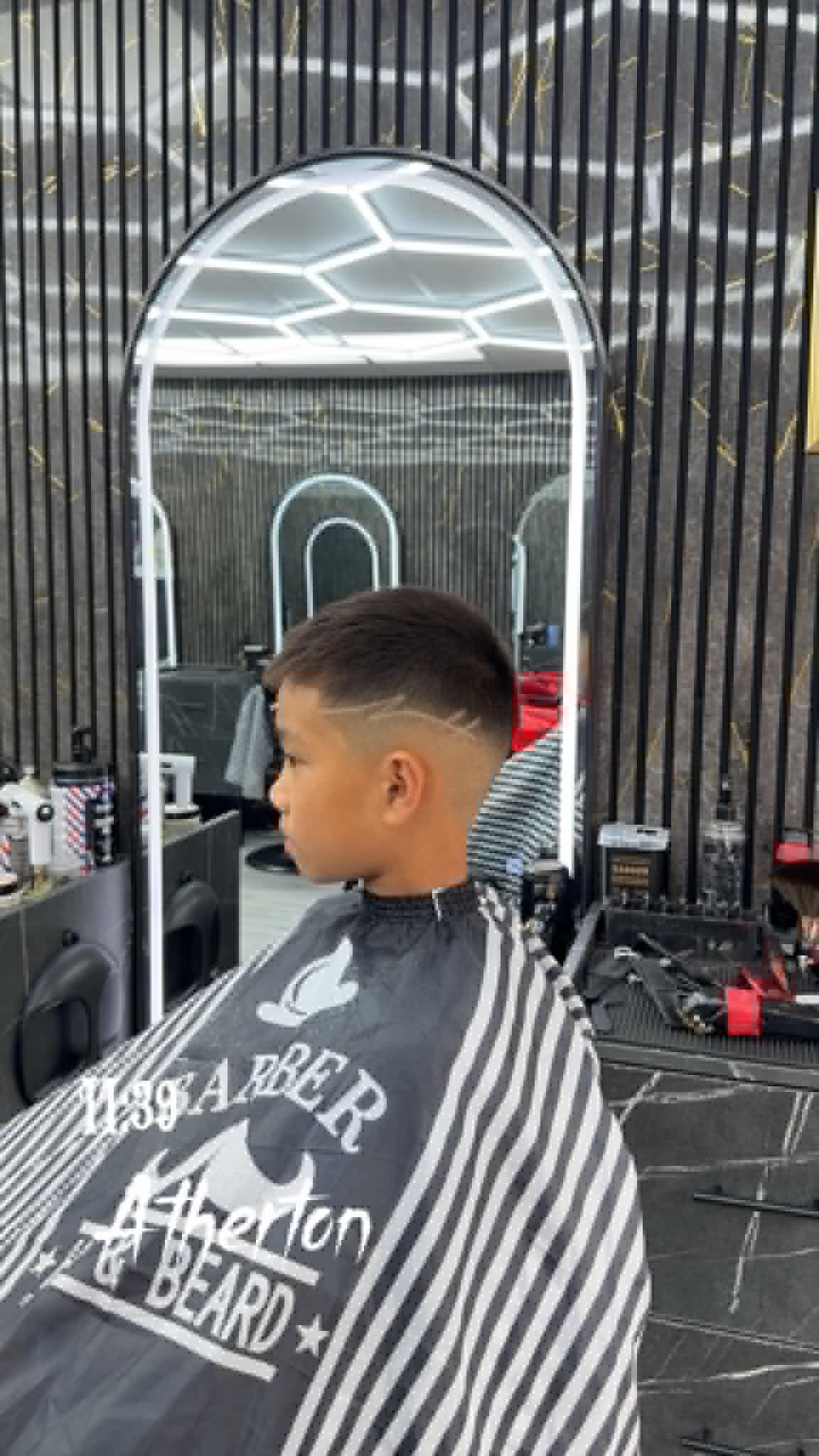 Sharp boys haircut completed at S&H Barber